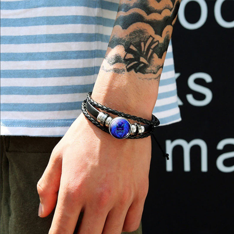 adjustable zodiac leather wrap bracelet with glowing blue constellation charm