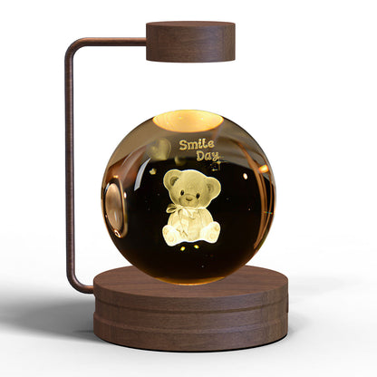 Crystal Ball Cosmic Dinosaur Night Light — USB Warm Glow, Walnut Base